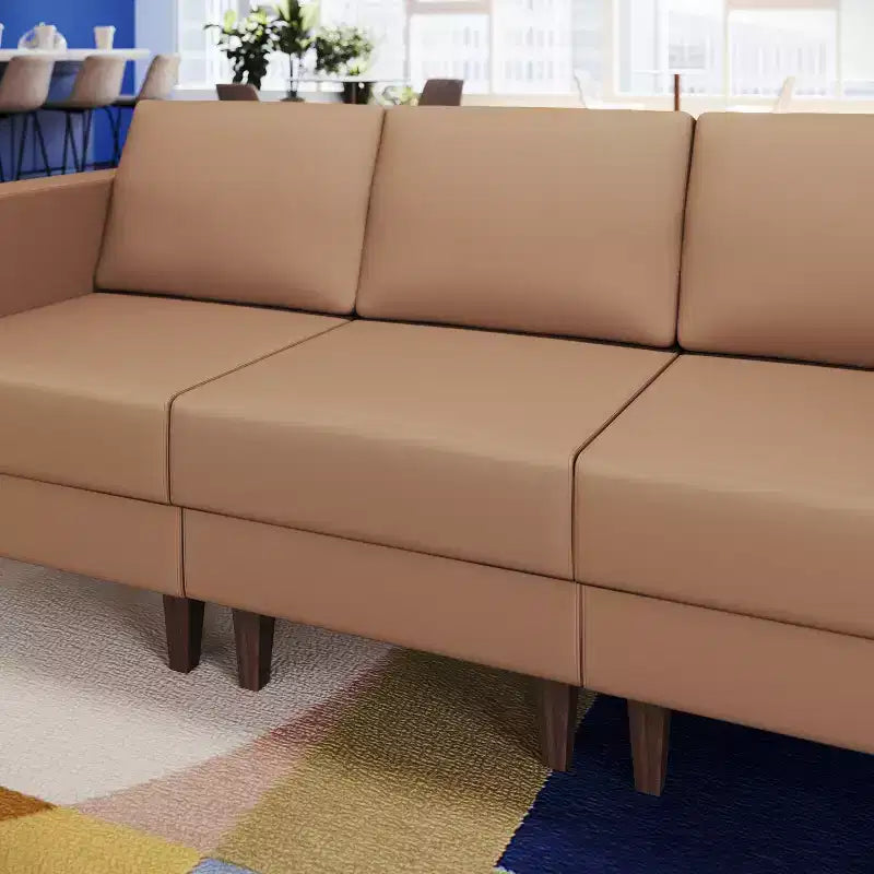 Fauteuil de réception capitonné avec pieds en noyer et patins réglables
